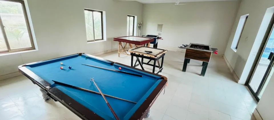 Swimming Pool — A pool area for guests to cool off and relax during the day.